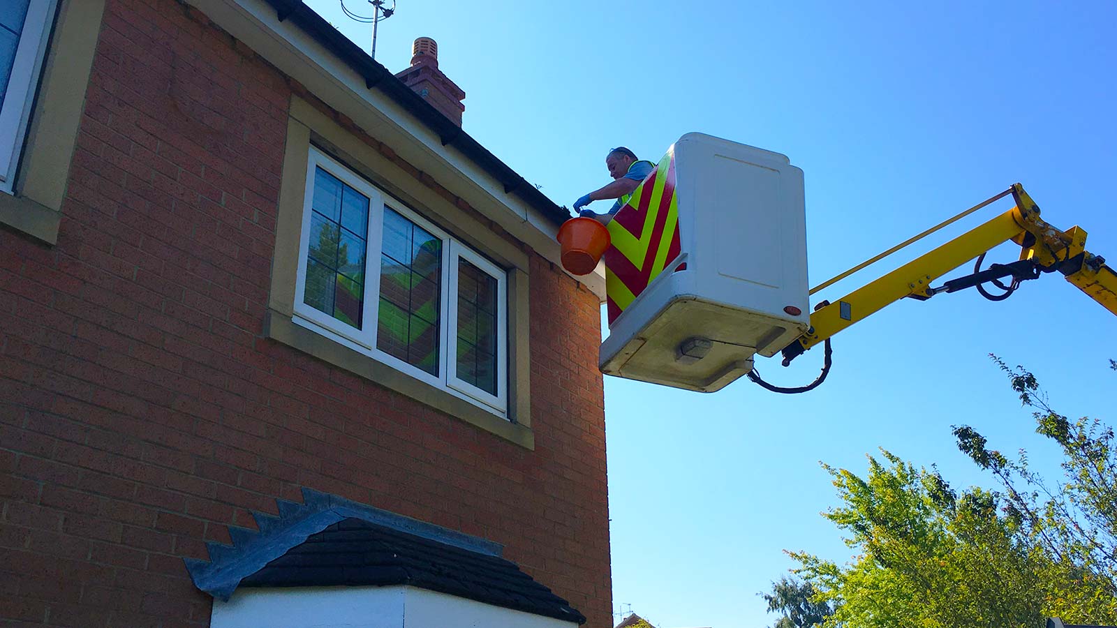 Cherry Picker being used for gutter cleaning